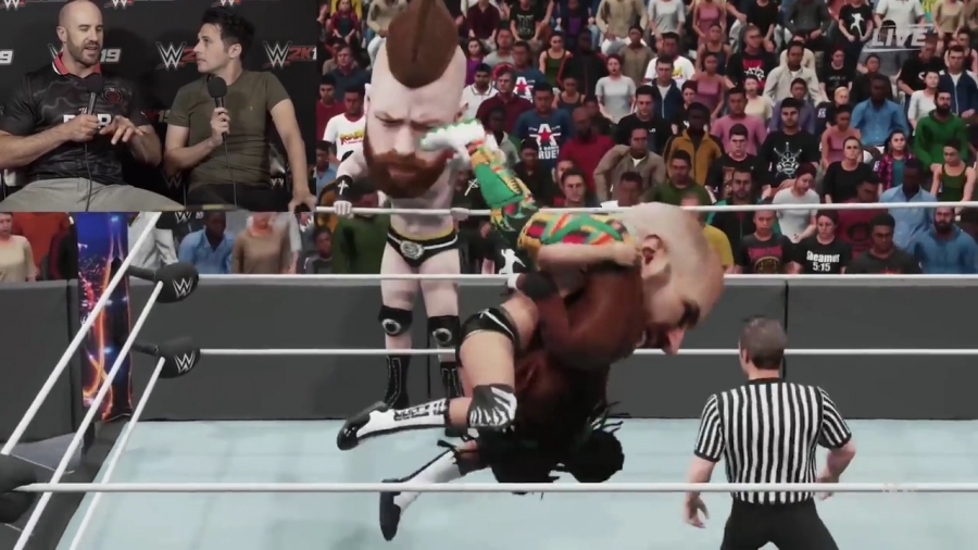 CESARO_REACTS_TO_WWE_2K19_BIG_HEAD_ENTRANCE_vs__THE_NEW_DAY_mp40326.jpg