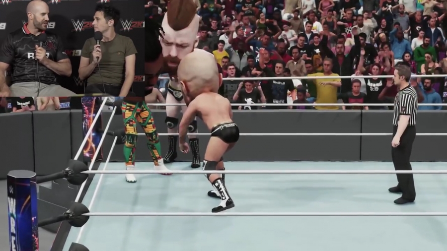 CESARO_REACTS_TO_WWE_2K19_BIG_HEAD_ENTRANCE_vs__THE_NEW_DAY_mp40362.jpg